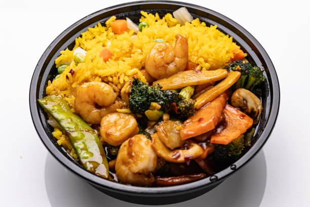 istock Asian rice with shrimp and vegetables served in disposable container 2190861371