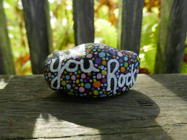 istock Sun and shadows with you rock kindness rock 2190861474