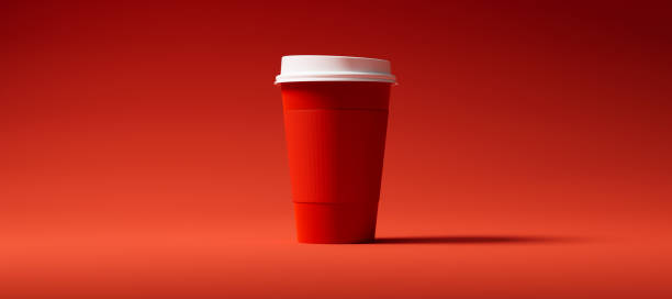 istock Minimalist Red Blank Paper Coffee Cup with holder centered on a red background. Takeaway paper coffee cup 3d render illustration 2190861988