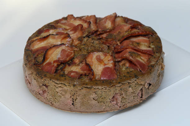 Unique savory cake topped with crispy bacon and rich flavors for a delightful culinary experience