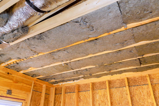 istock Insulation installation in a wooden structure with exposed beams and ducts 2190867974
