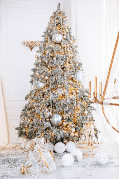 istock A beautifully decorated Christmas tree stands proudly in a cozy winter setting 2190873571