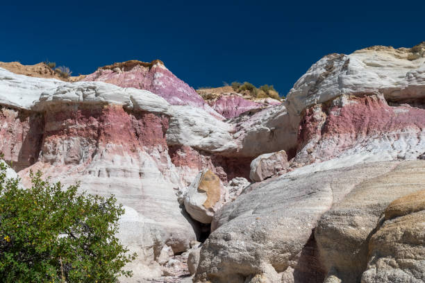 istock Colorful rock formations and cliffs in a picturesque landscape under a clear blue sky showcasing unique geological features during midday 2190876636