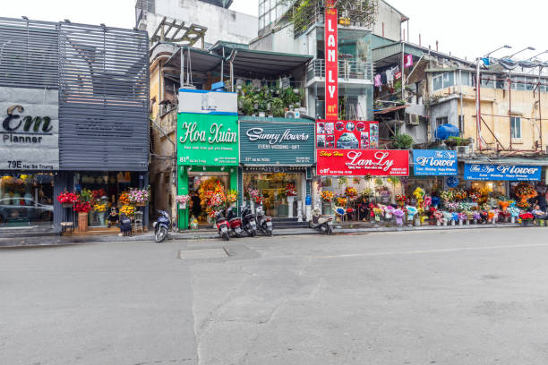 Hanoi, Vietnam - March 22, 2024: Flower shops in Hanoi's old quarter