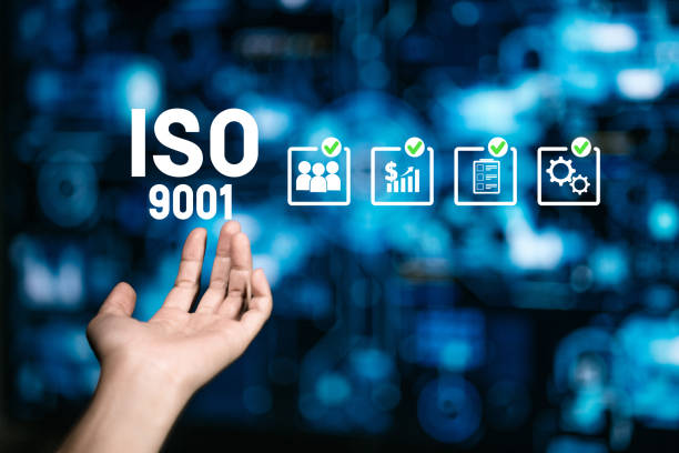 istock ISO 9001 certification concept with icons symbolizing team management, financial growth 2190882077