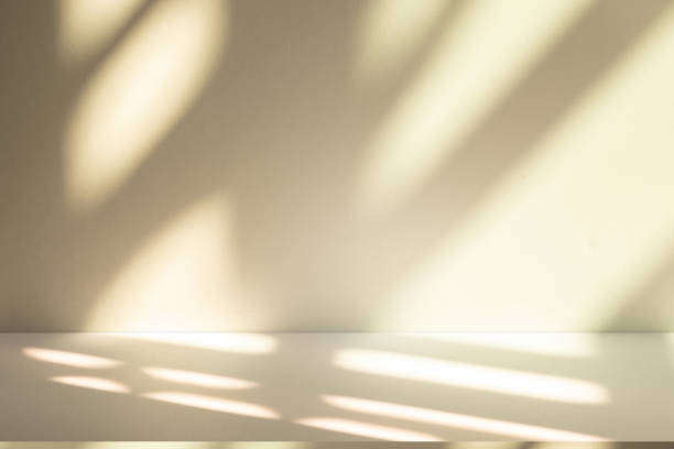 istock Studio style background wall decoration presentation uses white and beige tones. with shadows cast from a nearby window, concept creating a decorative 2190884429