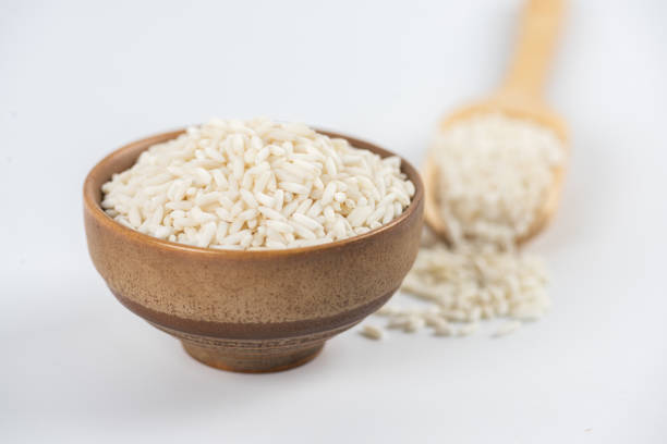 White sticky rice in bowl on white background