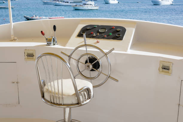 Luxury motorboat steering wheel and control panel.