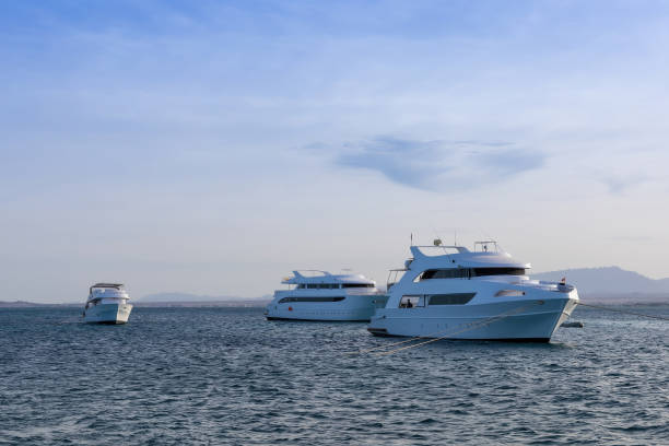 istock Serene coastal scene with luxury yachts anchored in tranquil blue waters 2190886281