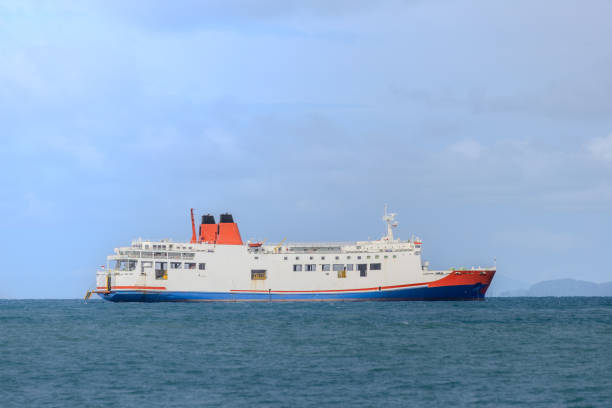 istock Ferry Ride on a Bright Sunny Day. Passenger boat under clear blue sky 2190891571
