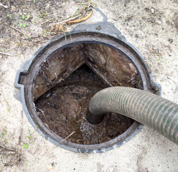 istock A dirty pipe is being cleaned out by a plumber 2190895790