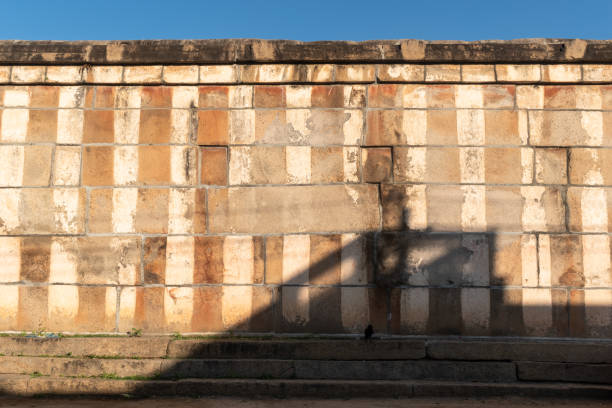 istock An old weathered temple wall painted in traditional red and white stripes 2190896551