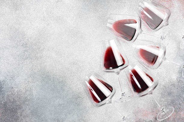 istock Glasses with red wine on a concrete table. Wine glasses. Top view. 2190902981