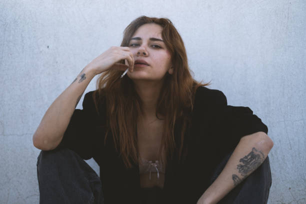 istock Young Woman Smoking Outdoors 2190903216