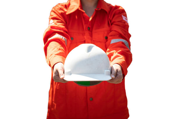 istock A construction worker holding a white safety helmet. Clipping path on white background. 2190905530