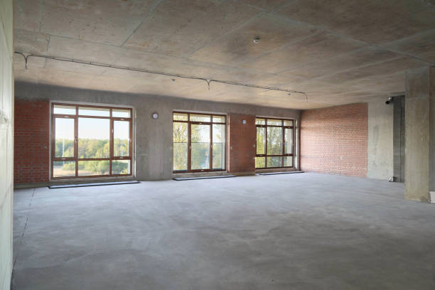 istock This spacious unfinished interior features large windows that offer stunning scenic views 2190910536