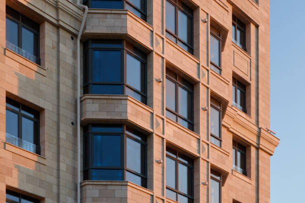 istock Innovative and Modern Architectural Design Featuring Elegant Windows and a Textured Facade 2190913295