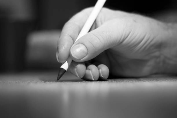 Pencil on open bible during a study