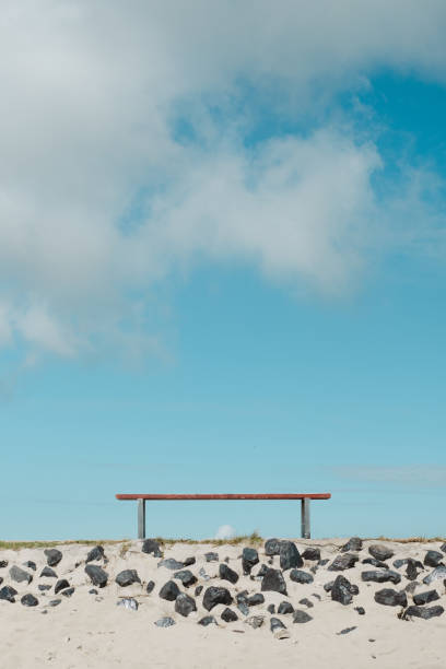 istock close-up of a bench on the beach 2190915940