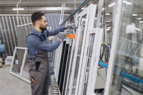 istock Factory worker cleaning pvc windows in production line 2190916511