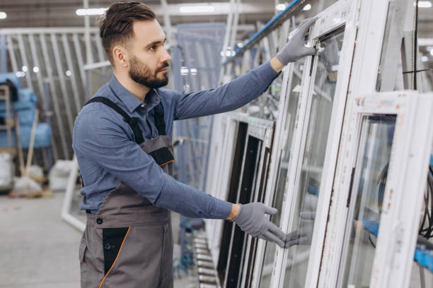 istock Factory worker checking aluminum and pvc windows and doors production 2190916515