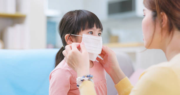 istock Mom cares for sick daughter 2190917214