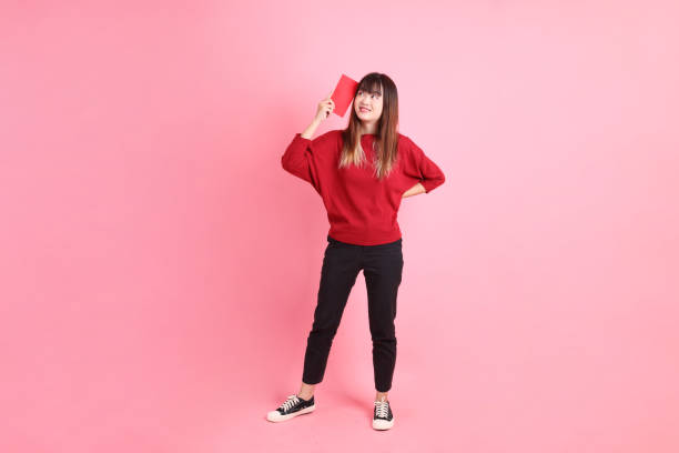 istock 20s woman in red t-shirt 2190926255