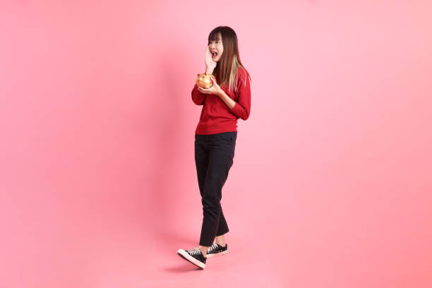 istock 20s woman in red t-shirt 2190926850