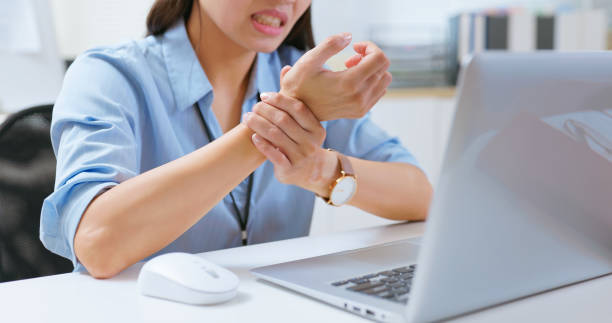 businesswoman has wrist pain
