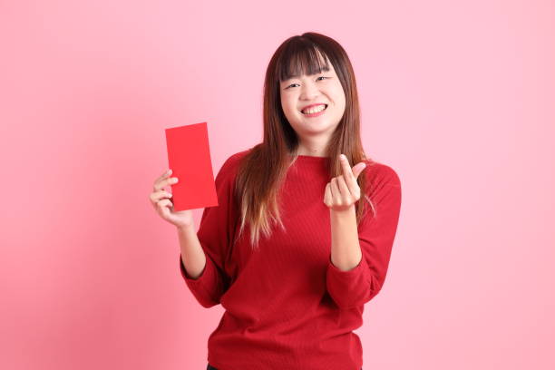 istock 20s woman in red t-shirt 2190930477