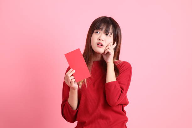 istock 20s woman in red t-shirt 2190930488