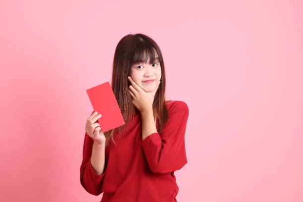 istock 20s woman in red t-shirt 2190930503