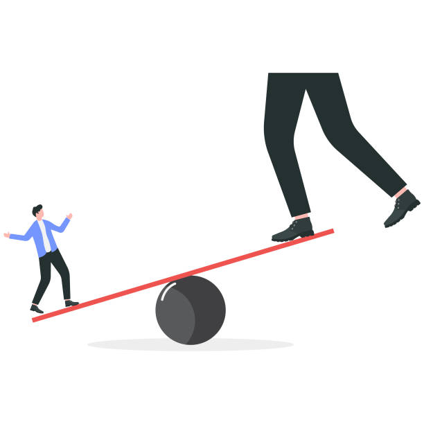 istock Businessman uses the seesaw to defeat the giant 2190933482