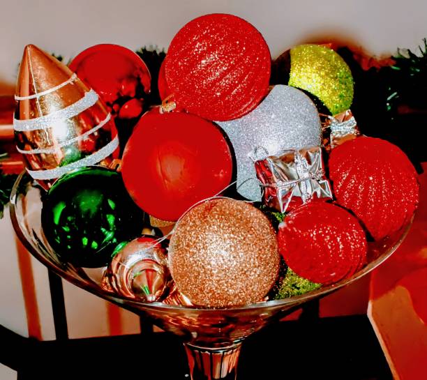 istock Festive and Generously Overfilled Martini Glass Filled with Ornaments 2190937904