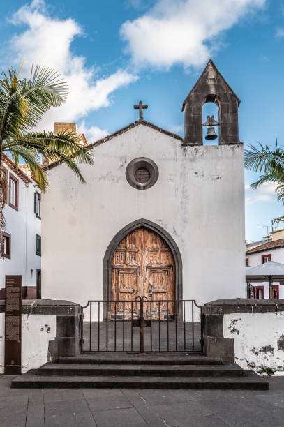 istock Rustic Church Facade With Bell Tower Against Blue Sky, Funchal, Madeira 2190938357