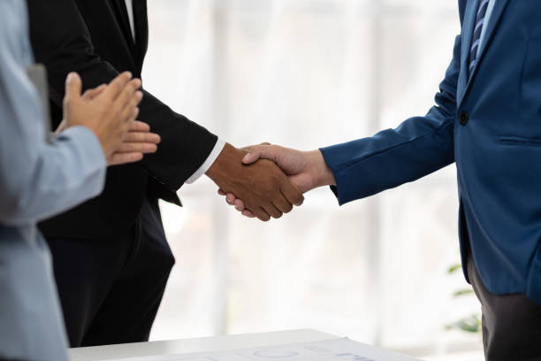 istock Businessman shake hands in a meeting. Collaborative support cooperation. 2190942848