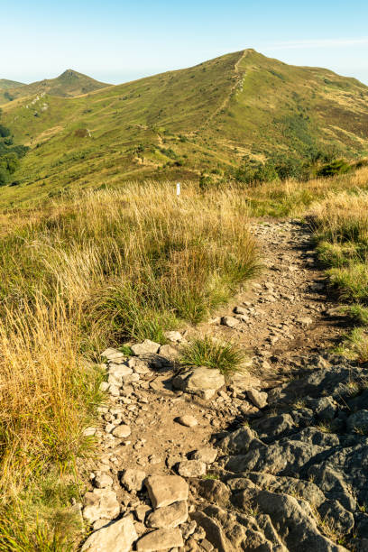 Beieszczady Mountains in late summer. Wildderness of polish mountains landscapeGolden Hills and Cloudy Skies Over Bieszczady mountains
