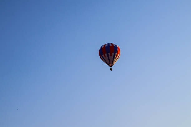Red hot air balloon (isolated on white)
