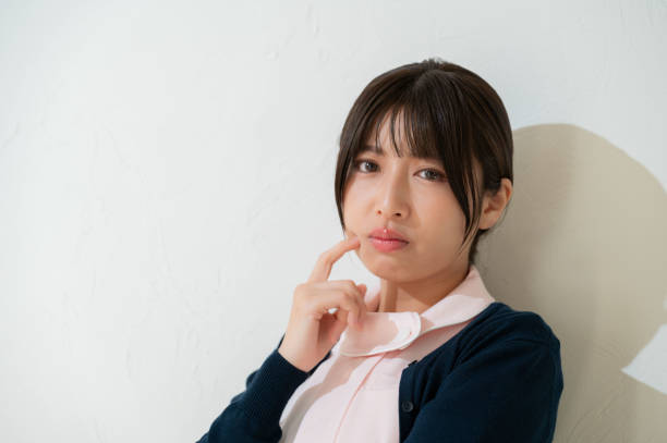 istock Japanese clinic staff who think on a white background 2190946480