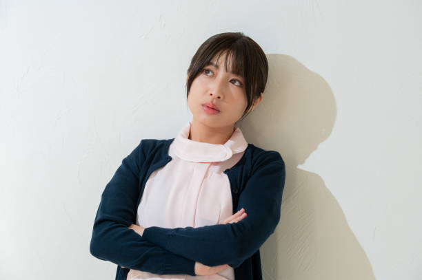 istock Japanese clinic staff who think on a white background 2190946499