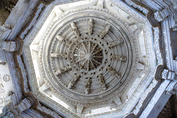istock India. Ranakpur. White marble carved ceiling 2190948224