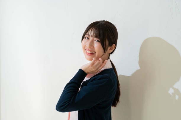 istock Japanese clinic staff smiling on a white background 2190948600