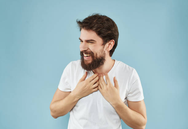 istock bearded man in a white t-shirt happy facial expression Studio 2190952351