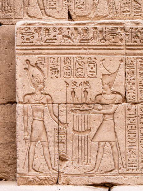 istock Hieroglyphs on a wall in the Karnak Temple complex, Luxor, Egypt on a bright morning 2 2190959288