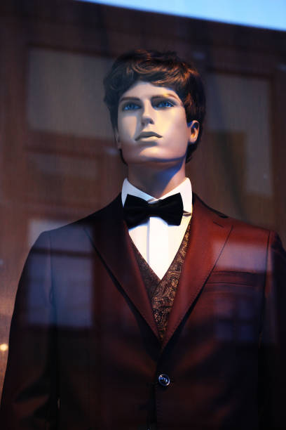 A mannequin dressed in a elegant costume