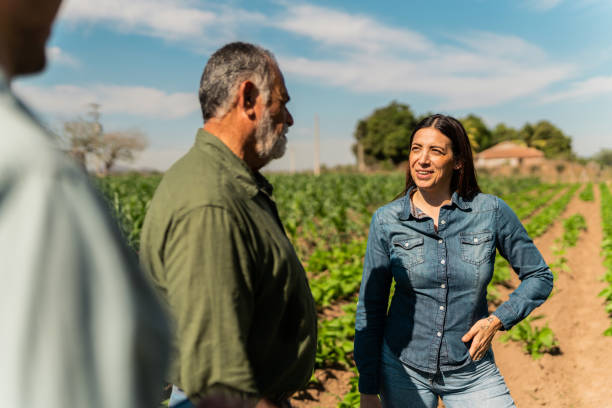 istock Farmers talking at agricultural field 2190962005