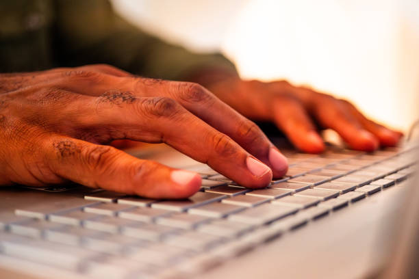 istock Close-up of man typing on laptop 2190963021