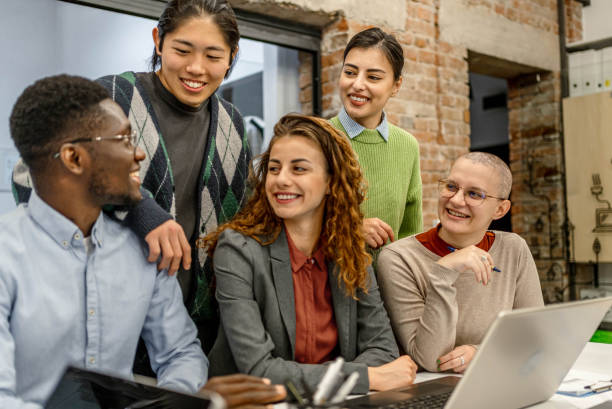 istock Young multi-ethnic businesspeople working together 2190963775