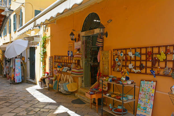 Corfu, Greece - June 6th 2024. A shop selling gifts and souvenirs in the historic centre of Corfu Old Town, Greece. A UNESCO World Heritage Site, it is a stunning blend of Venetian, French and British architectural influences. The Old Town features narrow, winding alleys of pastel-coloured Venetian buildings
