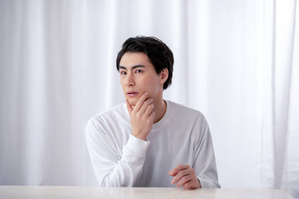 istock Japanese men checking their skin 2190970741